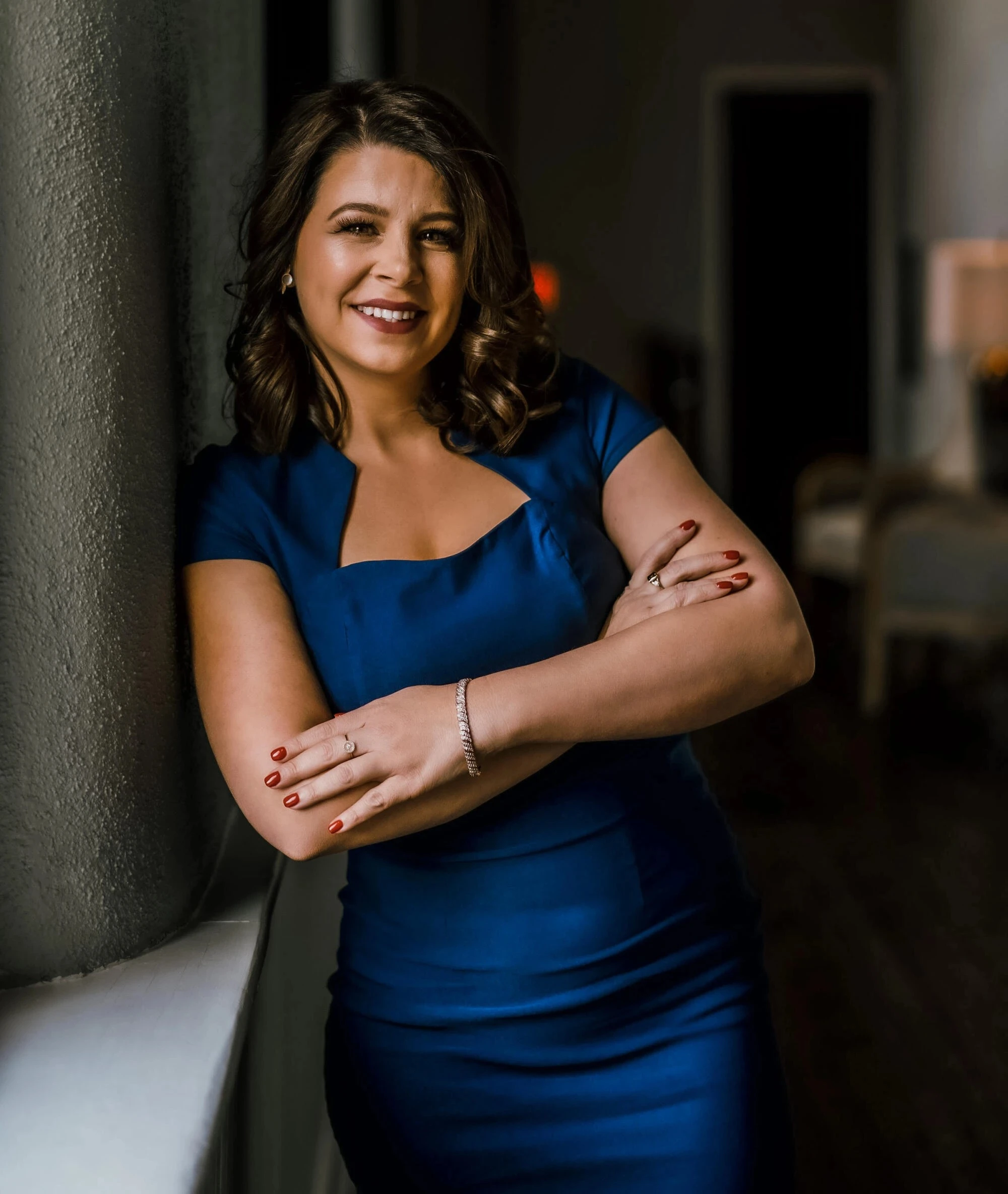 Sarah Perkins showcasing a featured Batesville property for sale